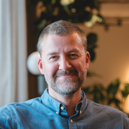 Professional headshot of Bryan Moore, Web Developer